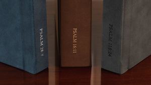 Photo album bindings with bible verses engraved.